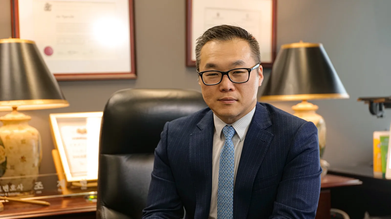 Jae Cho at his desk at VC Lawyers